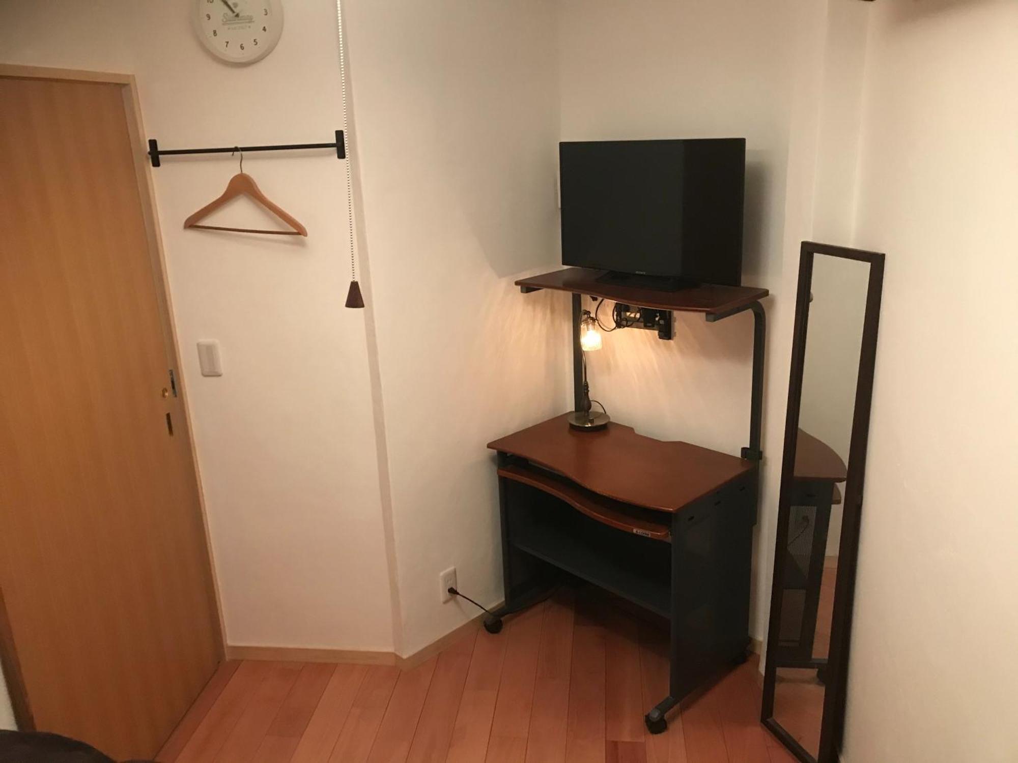 木と漆喰のモダンな部屋 Appartamento *